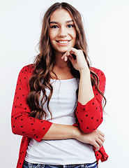 Image showing young pretty teenage hipster girl posing emotional happy smiling on white background, lifestyle people concept 