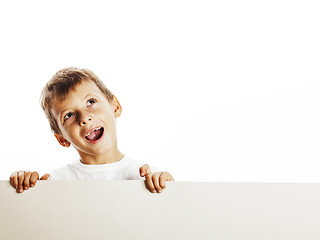 Image showing little cute boy holding empty shit to copyspace isolated close u