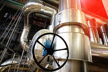 Image showing Equipment, cables and piping as found inside of a modern industr