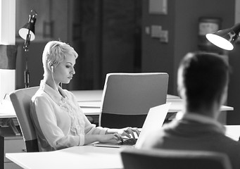 Image showing Businesswoman using laptop at work