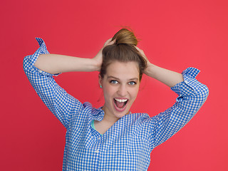 Image showing woman playing with her long silky hair