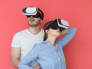 Image showing happy couple using VR-headset glasses of virtual reality