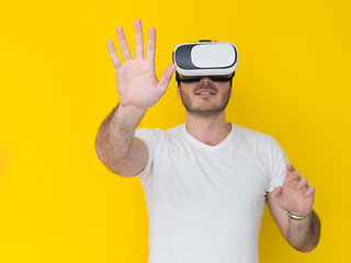 Image showing handsome man using VR headset glasses of virtual reality