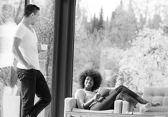 Image showing Beautifl black girl lying on couch