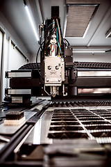 Image showing CNC Laser cutting of metal, modern industrial technology.