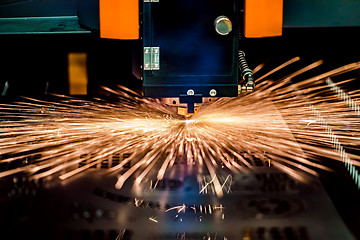 Image showing CNC Laser cutting of metal, modern industrial technology.