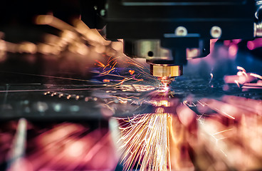 Image showing CNC Laser cutting of metal, modern industrial technology.