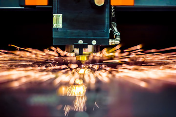 Image showing CNC Laser cutting of metal, modern industrial technology.