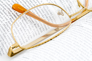 Image showing Glasses on Books