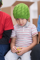 Image showing boys with cardboard boxes around them