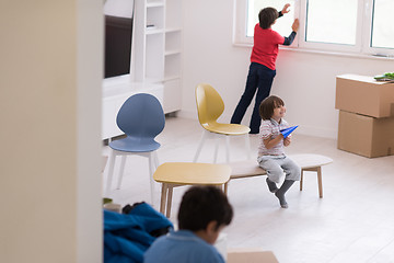 Image showing boys in a new modern home