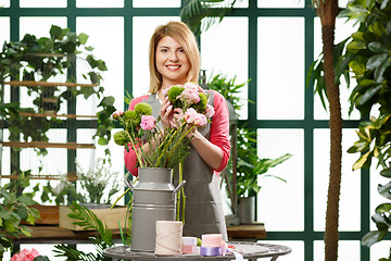 Image showing Photo of young flower seller