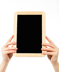 Image showing woman\'s hands holding a blackboard publicity