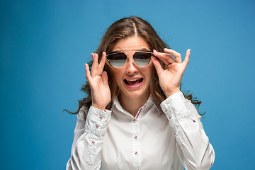 Image showing The young woman\'s portrait with happy emotions