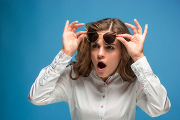 Image showing Portrait of young woman with shocked facial expression