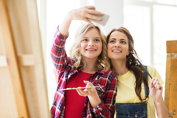 Image showing artist girls taking selfie at art studio or school