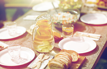 Image showing table with food for dinner at summer garden party