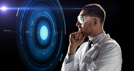 Image showing scientist in goggles looking at virtual projection