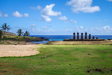 Image showing Anakena palm beach and Moais statues site ahu Nao Nao, easter is