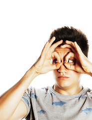 Image showing young pretty man isolated showing two ok signs smiling close up