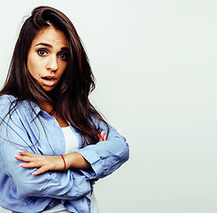 Image showing young happy smiling latin american teenage girl emotional posing on white background, lifestyle people concept 