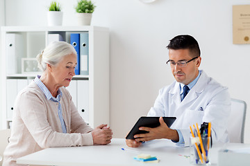 Image showing senior woman and doctor with tablet pc at hospital