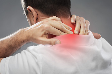 Image showing close up of man suffering from neck pain