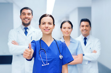 Image showing medics or doctors at hospital showing thumbs up