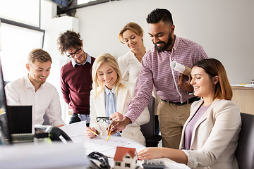 Image showing business team discussing house project at office