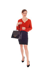 Image showing Business woman with black purse.