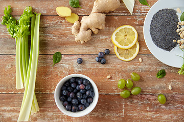 Image showing fruits, berries and vegetables on wooden table