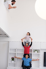 Image showing young boys posing line up piggyback