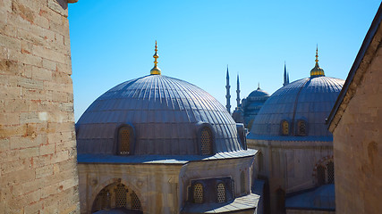 Image showing Blue mosque with Domes of the Hagia Sophia in the foreground, Istanbul, Turkey