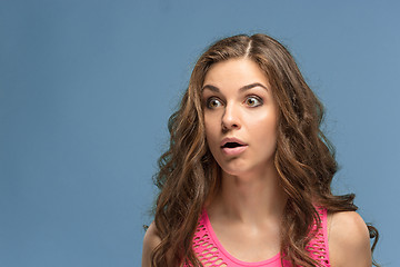 Image showing Portrait of young woman with shocked facial expression