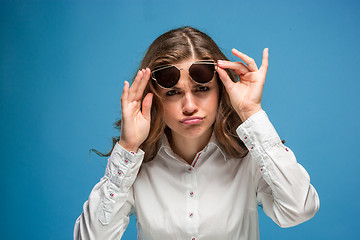 Image showing Portrait of young woman with shocked facial expression