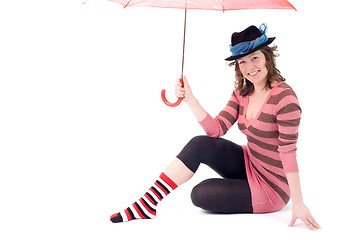 Image showing Colorful dressed female with umbrella VII