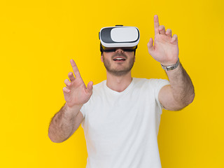 Image showing handsome man using VR headset glasses of virtual reality