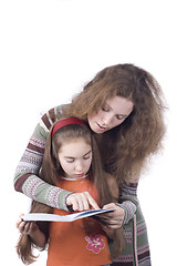 Image showing Daughter and mother learning together