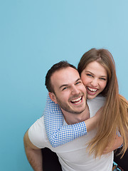 Image showing young man piggybacking his girlfriend