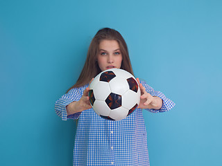 Image showing young woman playing with a soccer ball