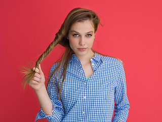 Image showing woman playing with her long silky hair