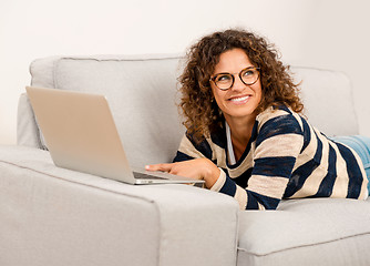 Image showing Beautiful woman working at home