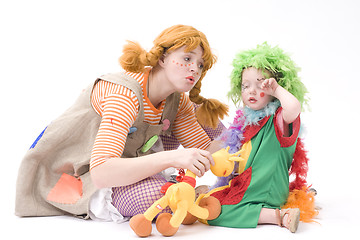 Image showing Big and little clown are playing