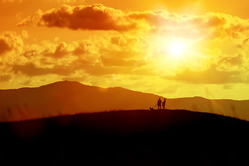 Image showing a couple and the dog out for a walk