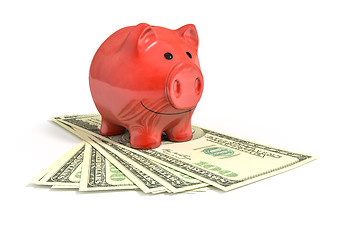 Image showing a red piggy bank over dollar notes