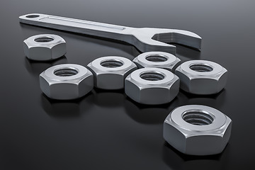 Image showing a hexagon nut with a wrench