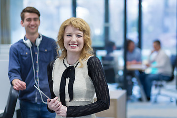 Image showing Business People Working With Tablet in startup office