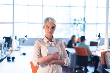 Image showing woman working on digital tablet in night office