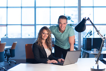 Image showing designers in the night startup office