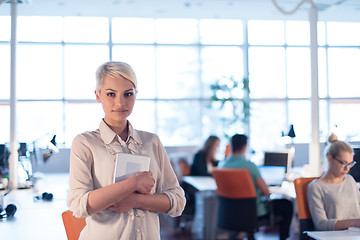 Image showing woman working on digital tablet in night office